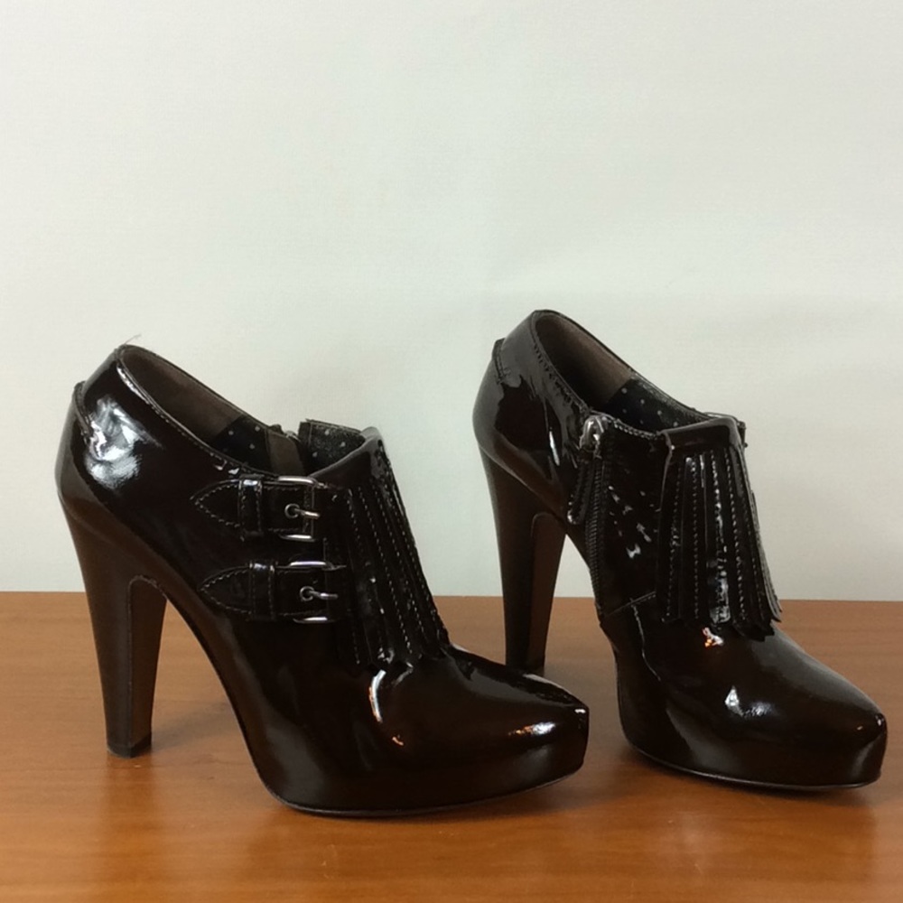 Moschino dark brown patent leather booties.